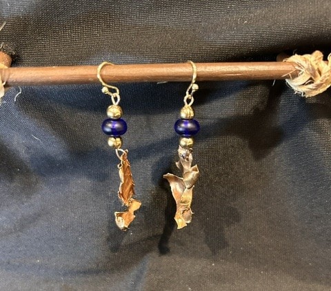 Hammered brass leaf earrings with navy blue disc beads